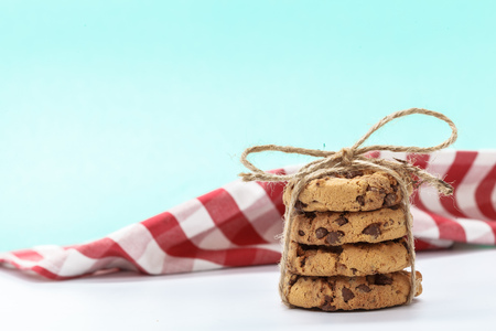 chocolate chunk cookies on a bright blue background