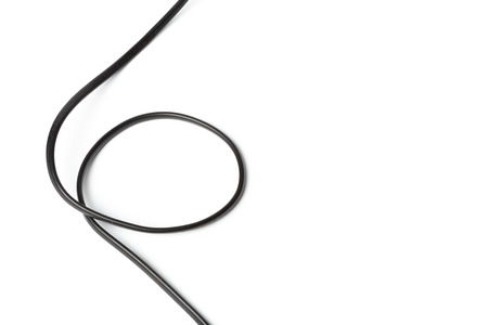 Black power cable with plug and socket isolated on whiteの写真素材