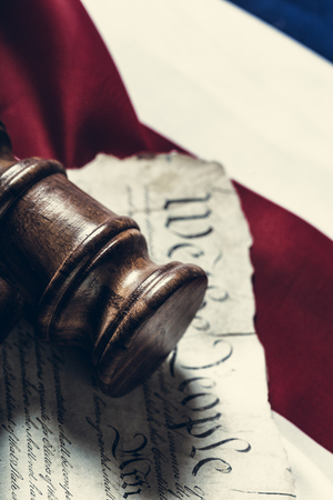 Wooden gavel and USA flagの写真素材