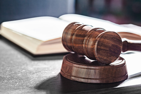 Judge's Gavel over black background