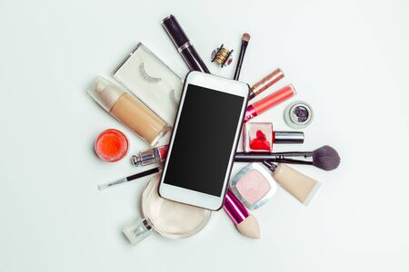 Brush and cosmetic isolated on a white background. Top view.の写真素材