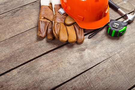 hardhat and old leather glovesの写真素材
