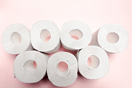 Toilet paper on pink backgroundの写真素材