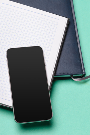 Black smartphone on the tableの写真素材