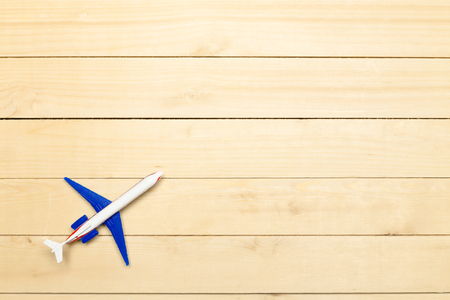 Model airplane on the wooden backgroundの写真素材