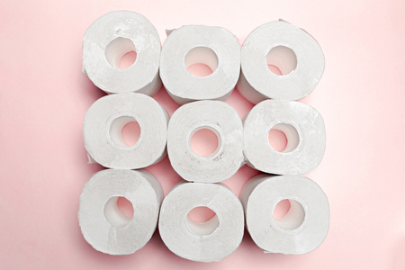 Toilet paper on pink backgroundの写真素材