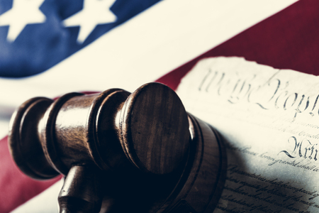 Wooden gavel and USA flag