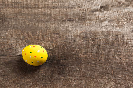 Vintage colorful easter eggs on wood table backgroundの写真素材