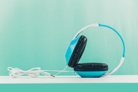 Headphones on blue backgroundの写真素材