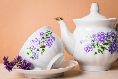 Cup of tea with teapot in vintage styleの写真素材
