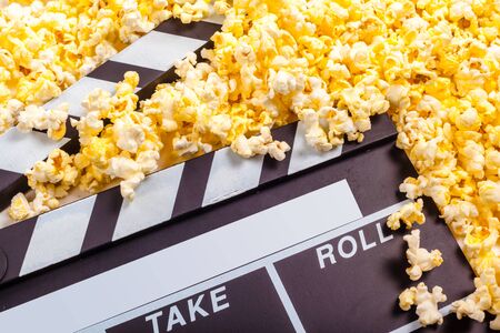 Movie clapper board and pop cornの写真素材