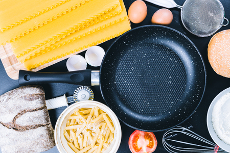 dry pasta spaghetti with ingredientの写真素材