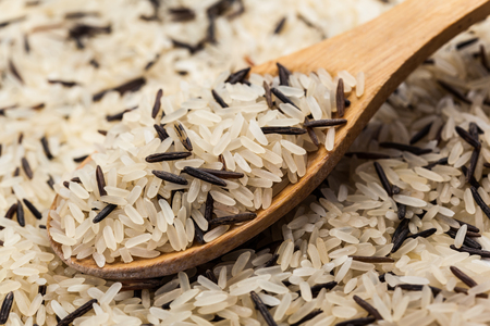 long rice background, uncooked raw cereals, macro closeupの写真素材