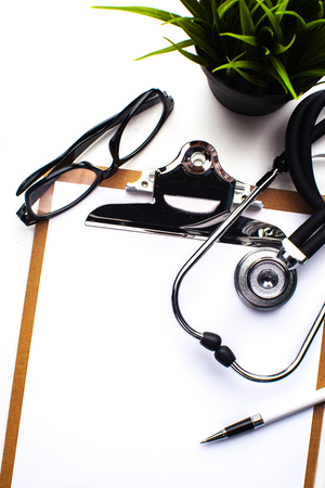 Empty prescription  lying on table with stethoscopeの写真素材