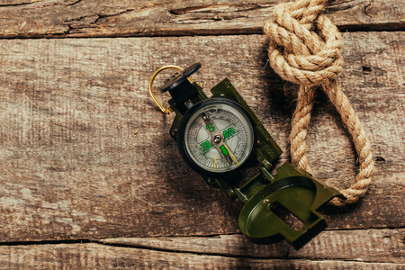 ship ropes and compass on wooden backgroundの写真素材