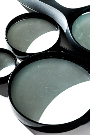 Magnifying glass isolated on whiteの写真素材