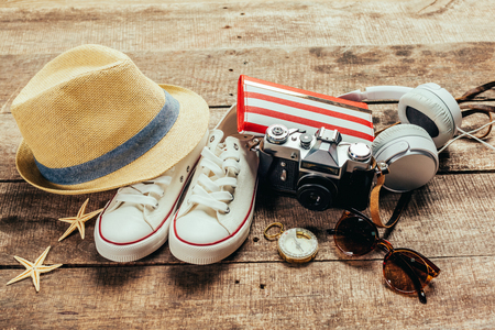 Set of trip stuff on wooden backgroundの写真素材