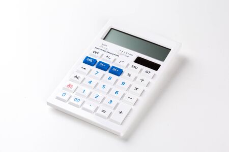 Top view of a calculator isolated on white backgroundの写真素材