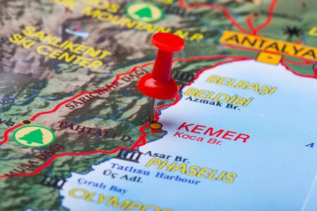 Travel destination points on a map indicated with colorful thumbtacksの写真素材