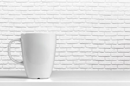 Coffee hot in a white cup on the table.の写真素材