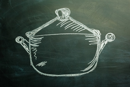 Pan drawn on a black dirty chalkboardの写真素材