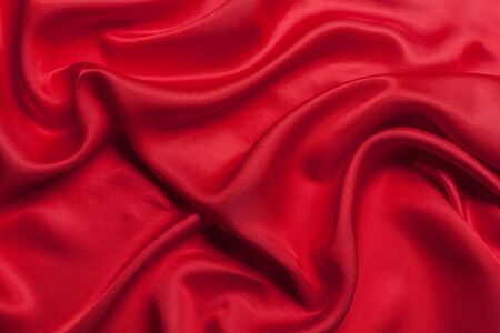 Red cloth waves background textureの写真素材
