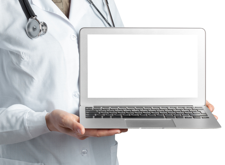 Female doctor holding a laptop, isolated on white backgroundの写真素材