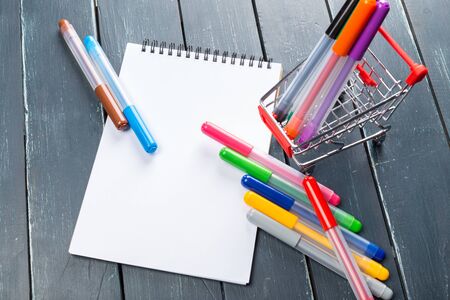 clean sheets on table with markersの写真素材