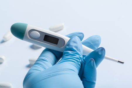 thermometer and pills