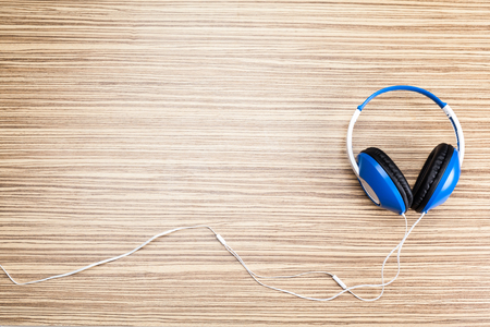 headphones on wooden backgroundの写真素材