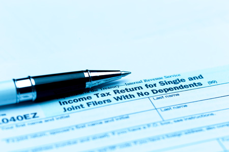 US tax form with penの写真素材