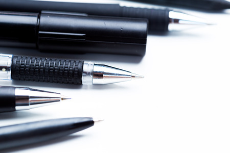 Pens and pencils on white backgroundの写真素材
