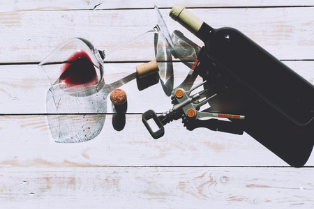 Glass and bottle with red wineの写真素材