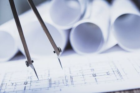 stack of white construction blueprintsの写真素材