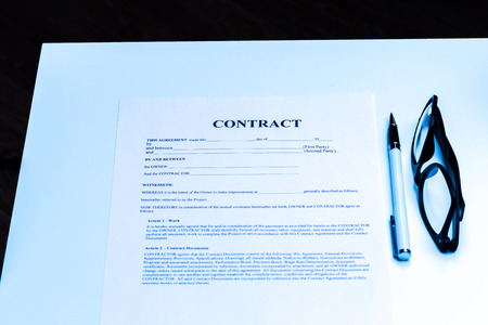 Close-up of pen on contract.の写真素材
