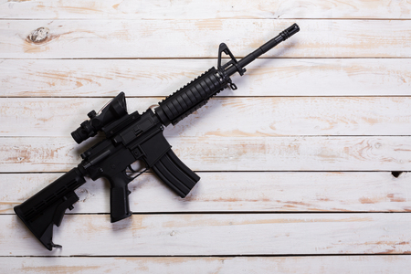 Assault automatic rifle on white wooden tableの写真素材