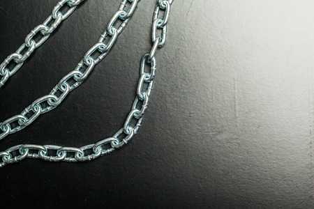 chains on a black backgroundの写真素材
