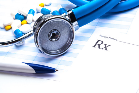 Empty prescription  lying on table with stethoscopeの写真素材