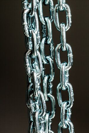 Strong chain on black background