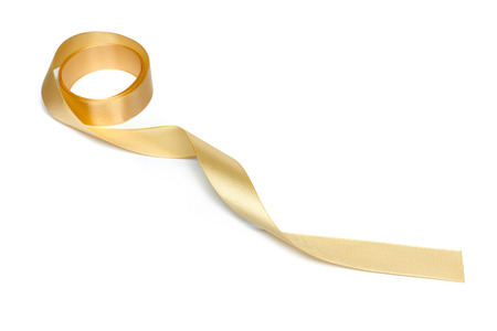 Golden ribbon isolated on whiteの写真素材