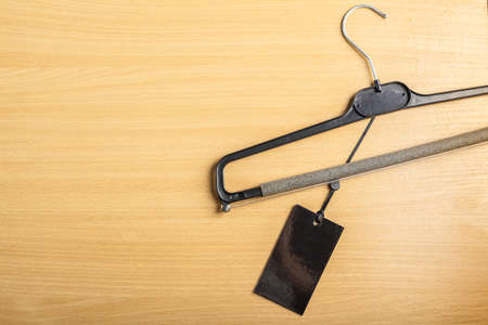 Blank tag on wooden backgroundの写真素材