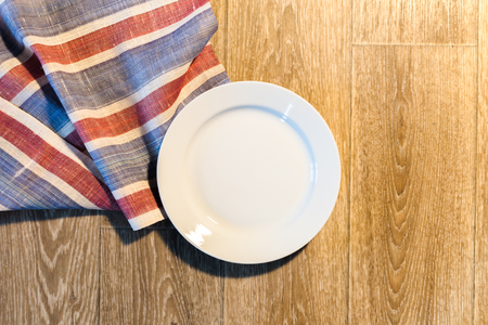 White Plate on a Tableclothの写真素材