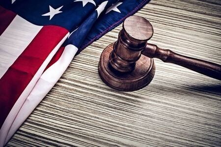 the judge gavel and background with usa flagの写真素材
