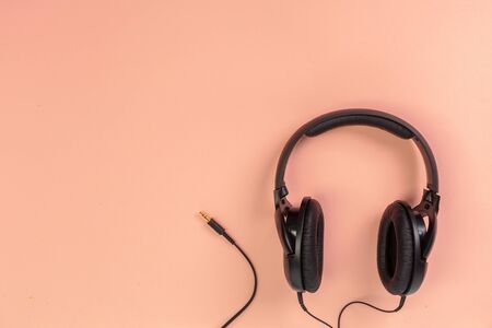 headphones on orange  backgroundの写真素材