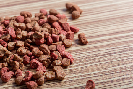 pets food on wooden floorの写真素材