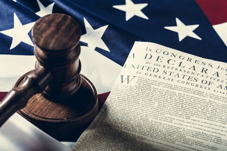 Wooden gavel and USA flagの写真素材