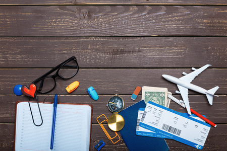 traveler objects on wooden tableの写真素材