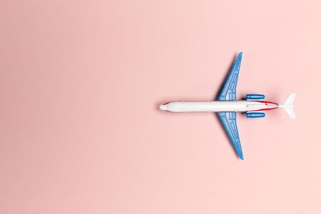 airplane on color backgroundの写真素材