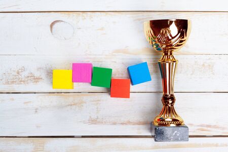 trophy on wood table