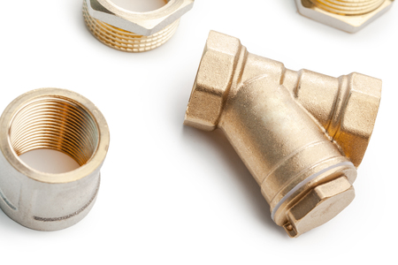 Set of metal-plastic plumbing couplings, adapters, plugs isolated on white backgroundの写真素材